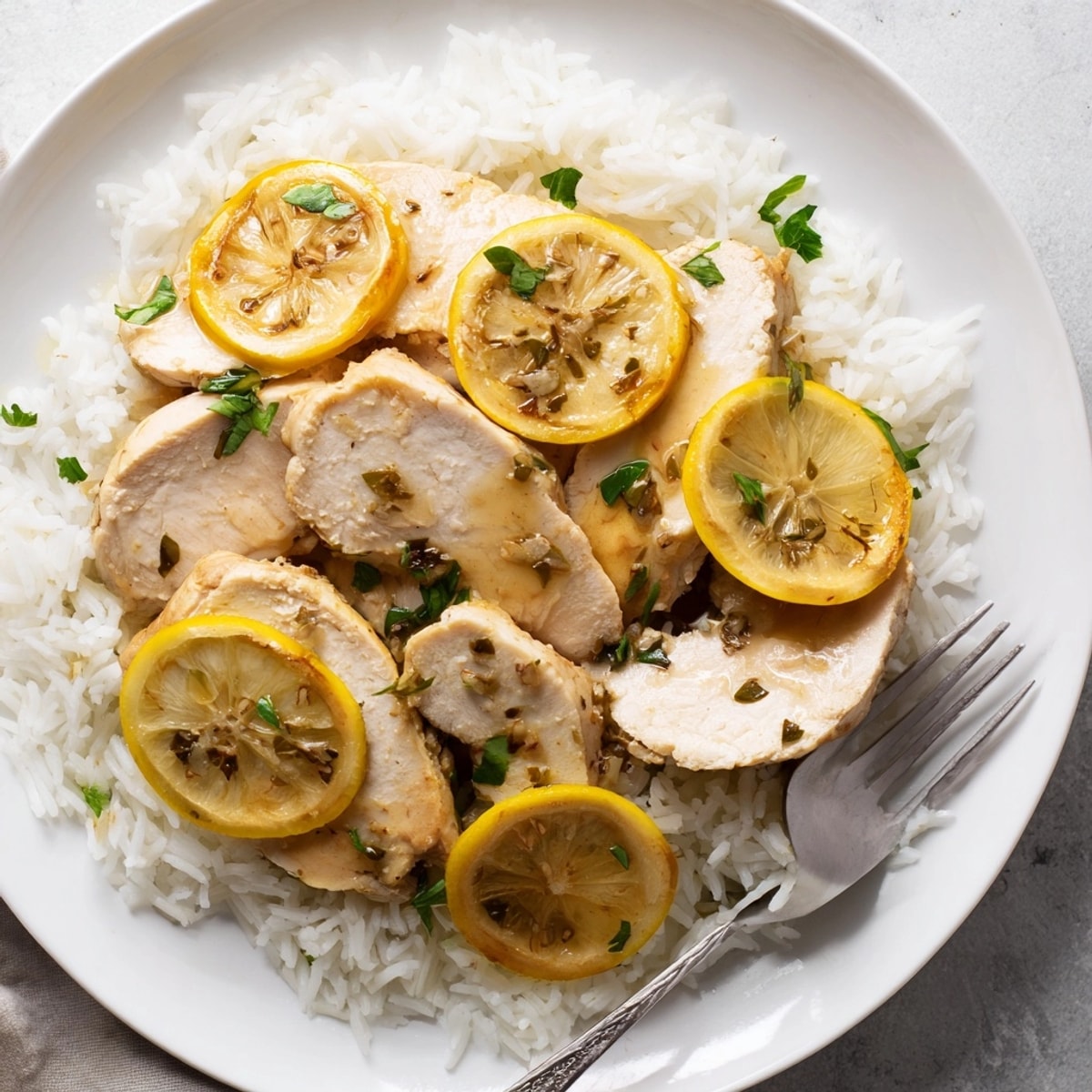 Lemon herb chicken and rice: Juicy chicken shines with bright citrus flavors.