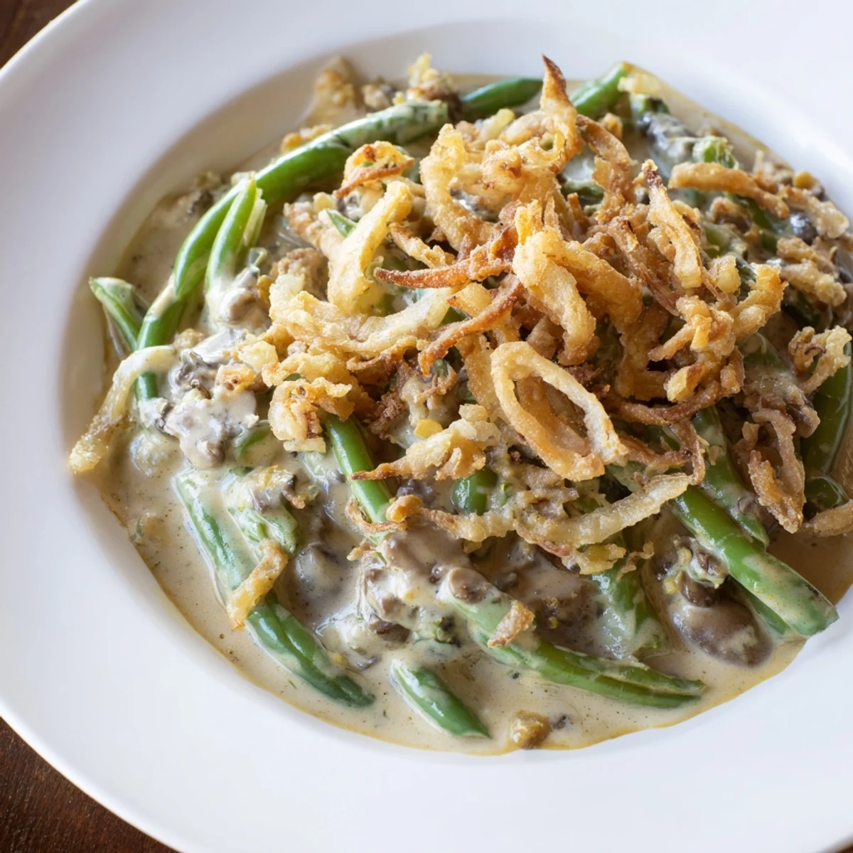 Creamy, savory Old-School Green Bean Casserole: featuring tender beans and a crunchy onion topping.