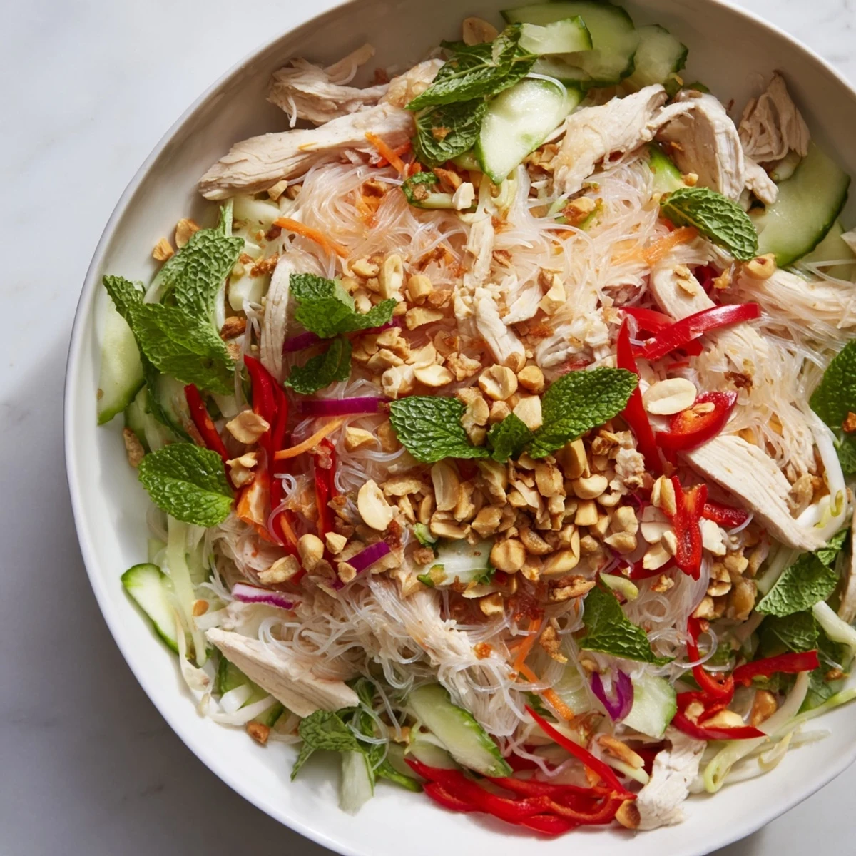 This refreshing Vietnamese Crunch Noodle Salad features colorful veggies and flavorful shredded chicken.