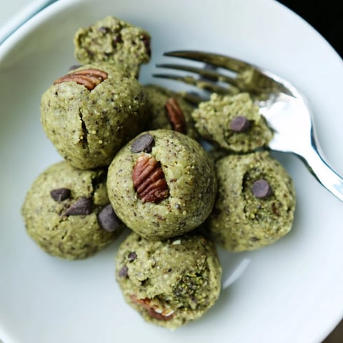 Matcha Gingerbread Cookie Dough Protein Bites, rolled into perfect spheres, ready to enjoy as a quick snack.