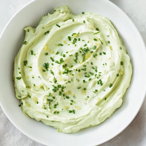 This easy Avocado Cottage Cheese Dip features a smooth texture and the tangy taste of fresh lemon juice.